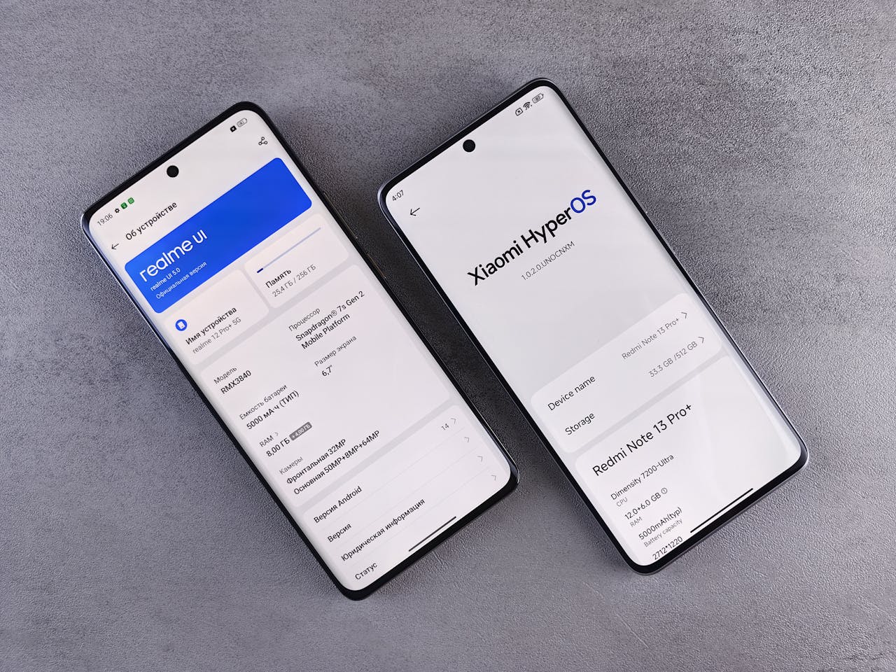 Comparison of two smartphones showing Realme UI and Xiaomi HyperOS interfaces on their screens.